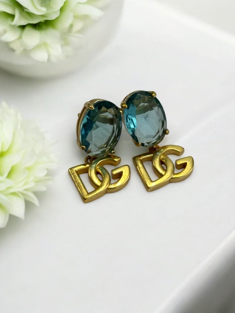 18K GOLD PLATED REFLECTED COLOR OF BLUE OVAL DIAMOND BRANDED EARRING