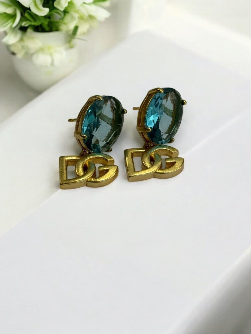 18K GOLD PLATED REFLECTED COLOR OF BLUE OVAL DIAMOND BRANDED EARRING