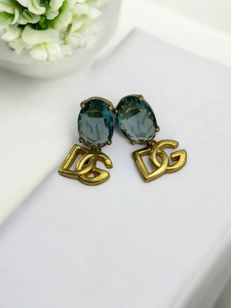 18K GOLD PLATED REFLECTED COLOR OF BLUE OVAL DIAMOND BRANDED EARRING