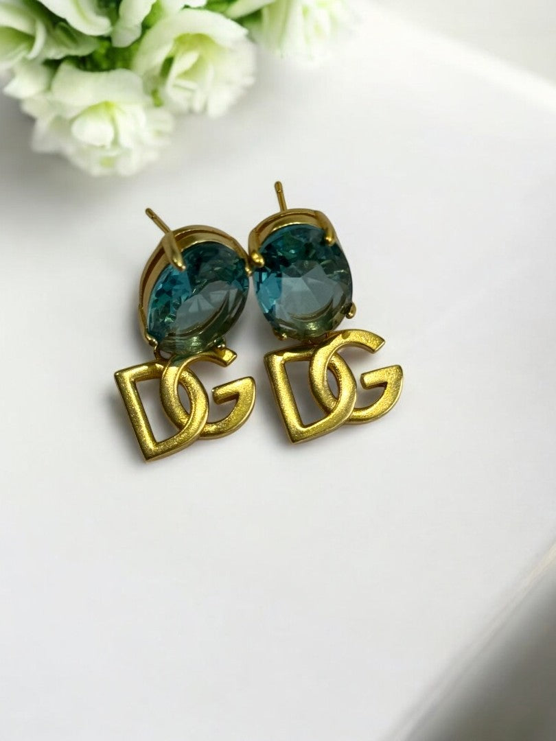 18K GOLD PLATED REFLECTED COLOR OF BLUE OVAL DIAMOND BRANDED EARRING