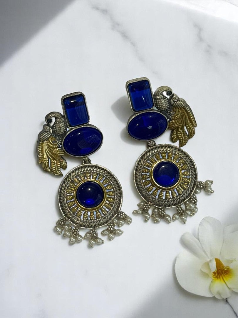 GERMAN SILVER DUAL TONE BLUE STONE PEACOCK DANGLE EARRINGS