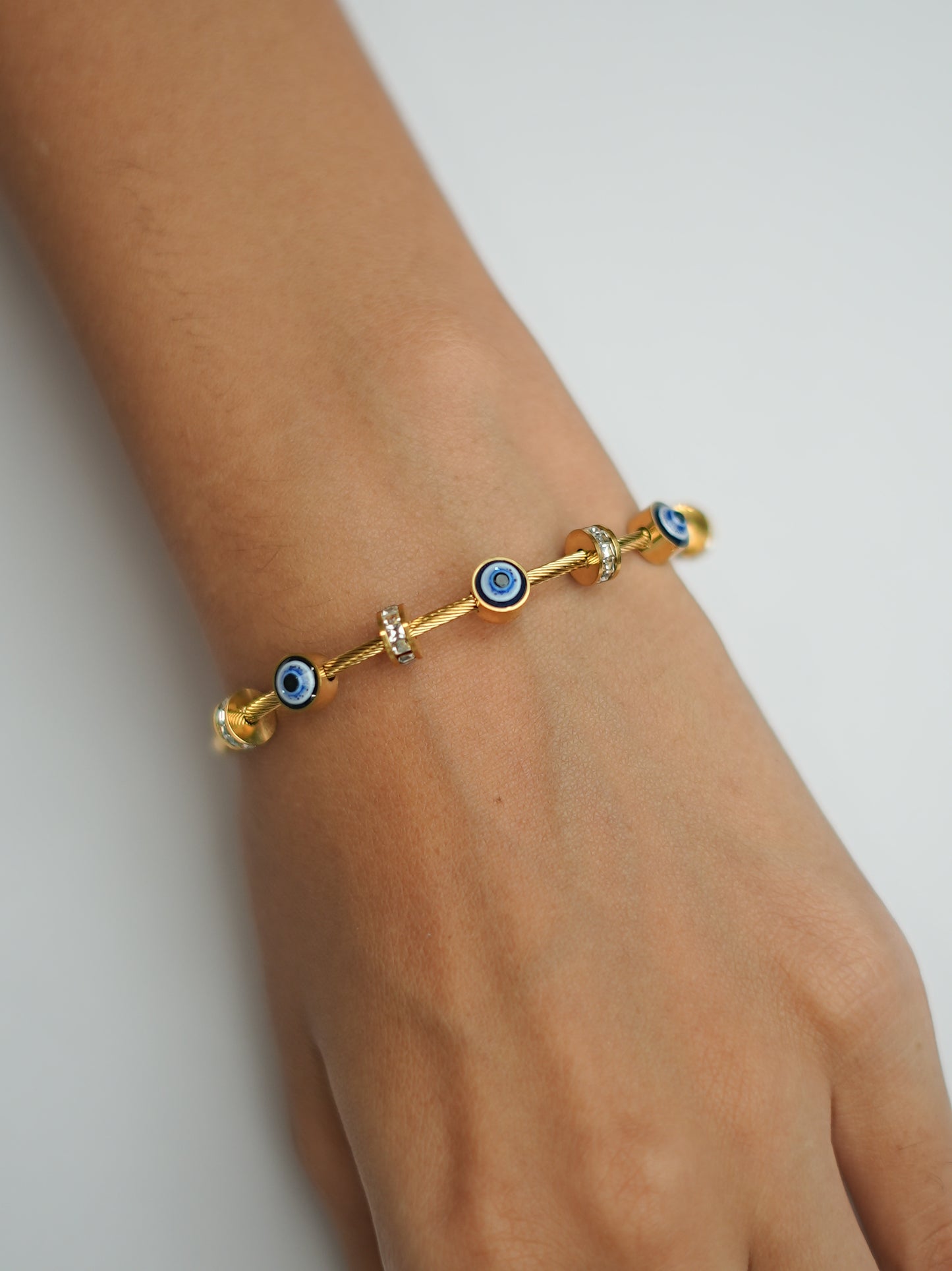 GOLDEN BASE WITH DIAMOND BALLS AND EVIL EYE