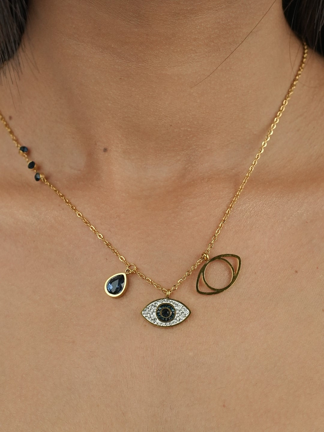 GOLDEN EVIL EYE CHARMS AND BLUE DROP