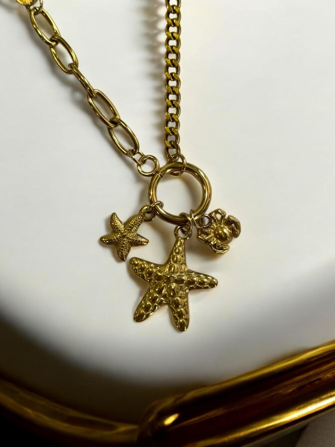 GOLDEN CHAIN WITH BEACH CHARM LIKE STAR FISH AND CRAB