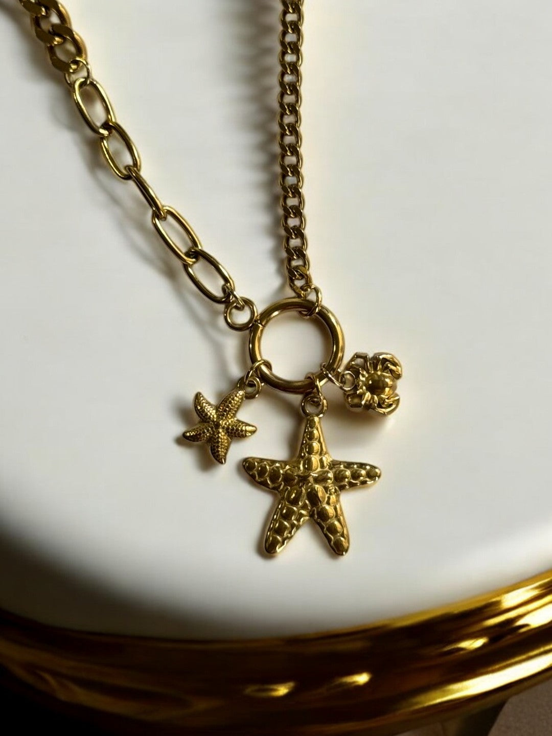 GOLDEN CHAIN WITH BEACH CHARM LIKE STAR FISH AND CRAB