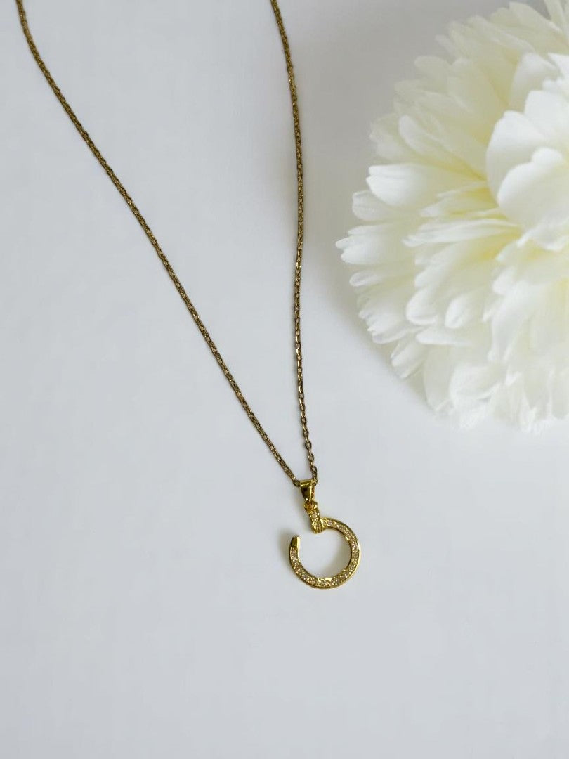 GOLDEN CHAIN WITH DIAMOND NAIL PENDENT