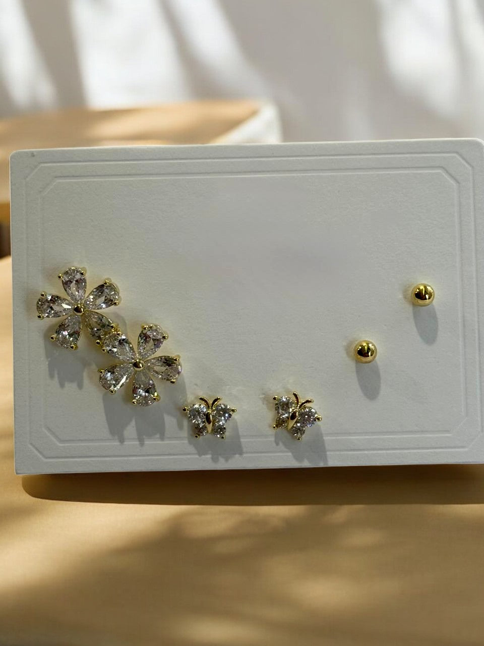 THREE PAIR OF EARRINGS