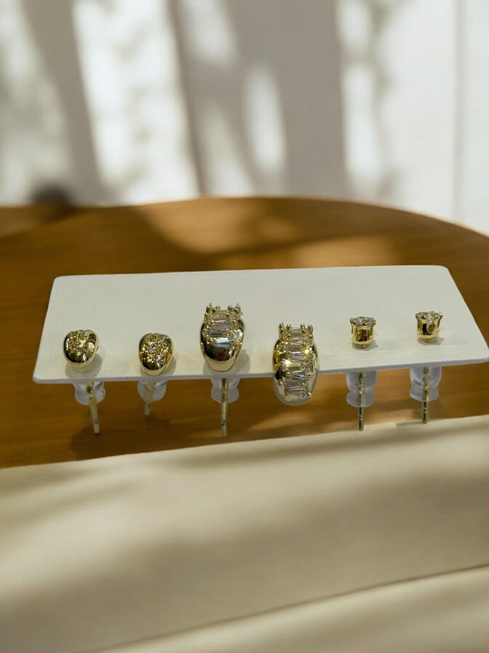 THREE PAIR OF EARRINGS