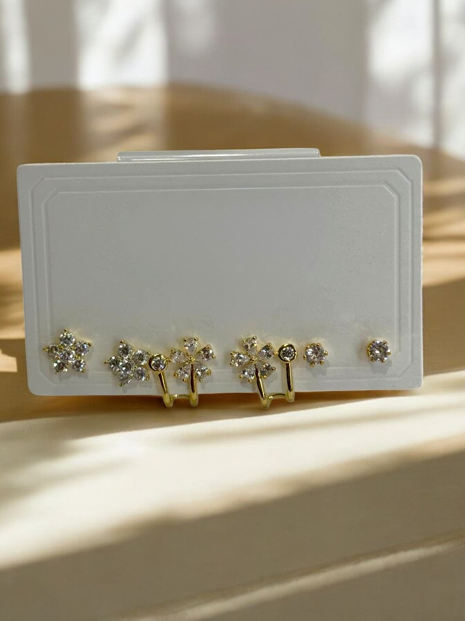 THREE PAIR OF EARRINGS
