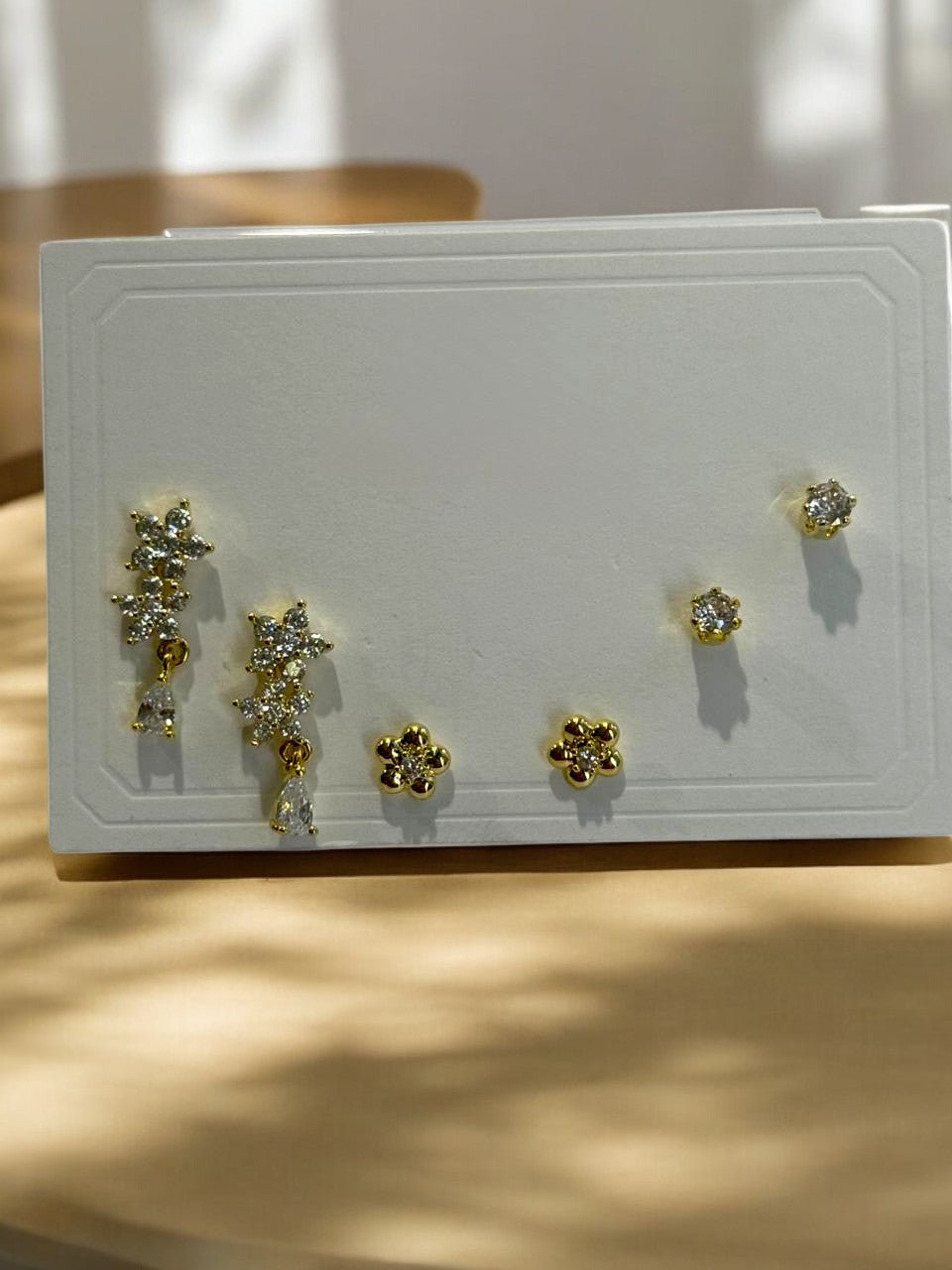THREE PAIR OF EARRINGS