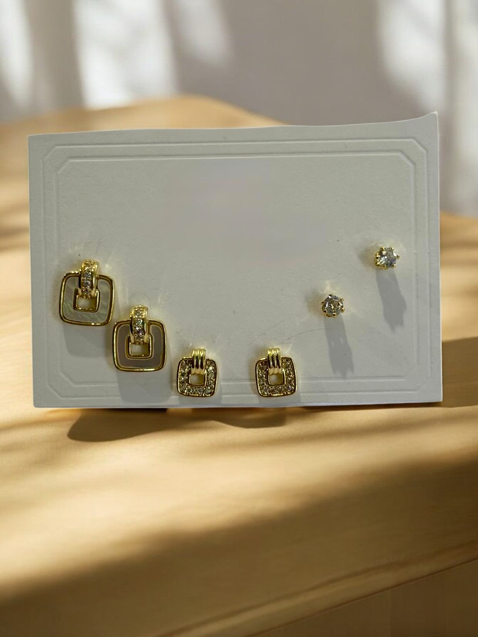 THREE PAIR OF EARRINGS