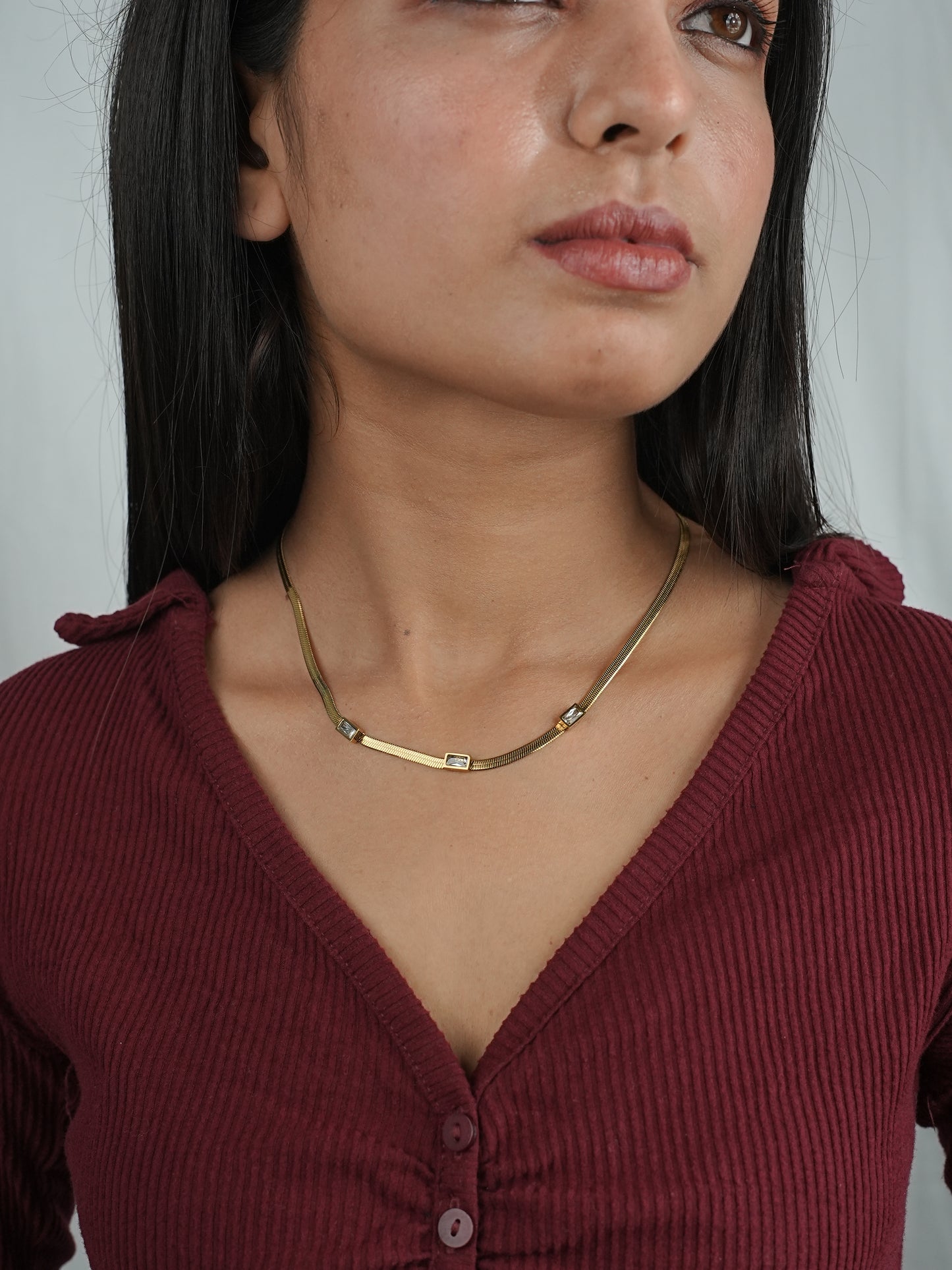 GOLDEN CHAIN WITH WHITE STONE