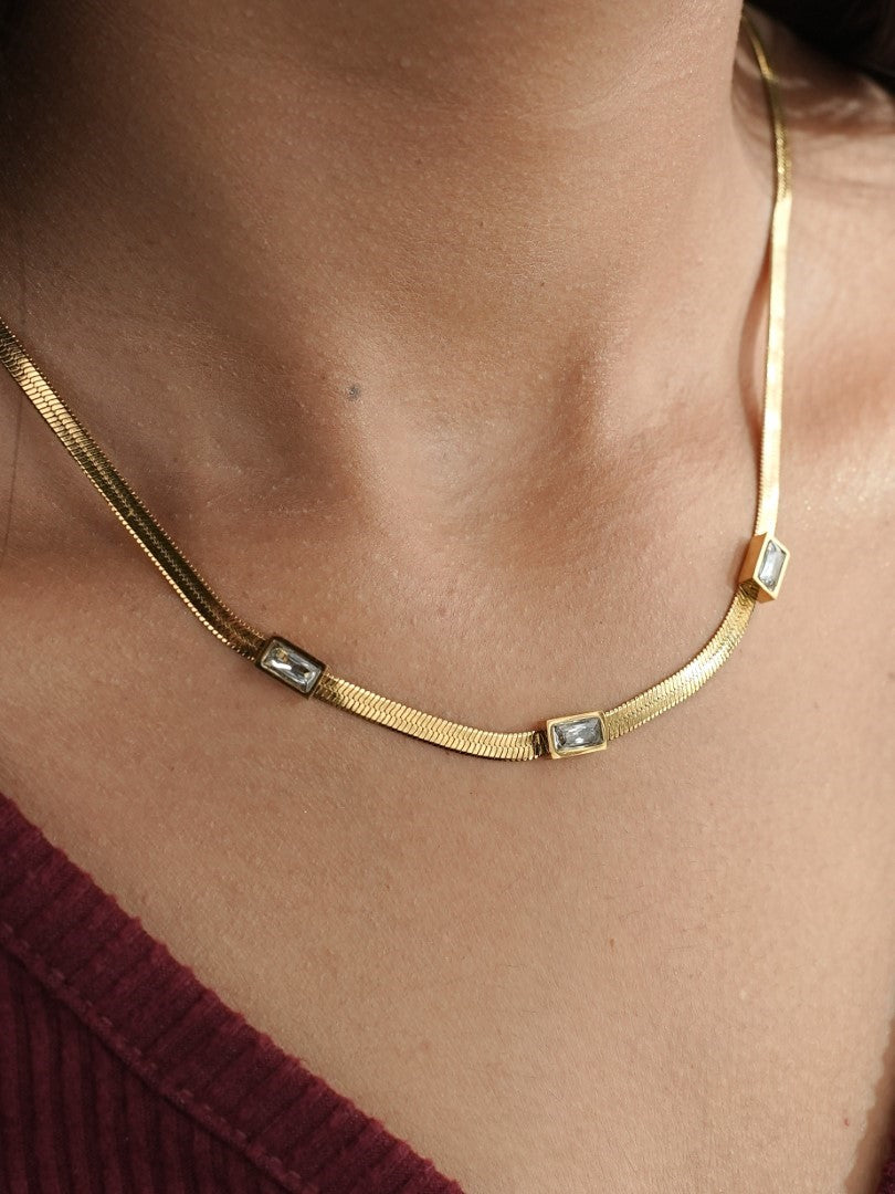 GOLDEN CHAIN WITH WHITE STONE