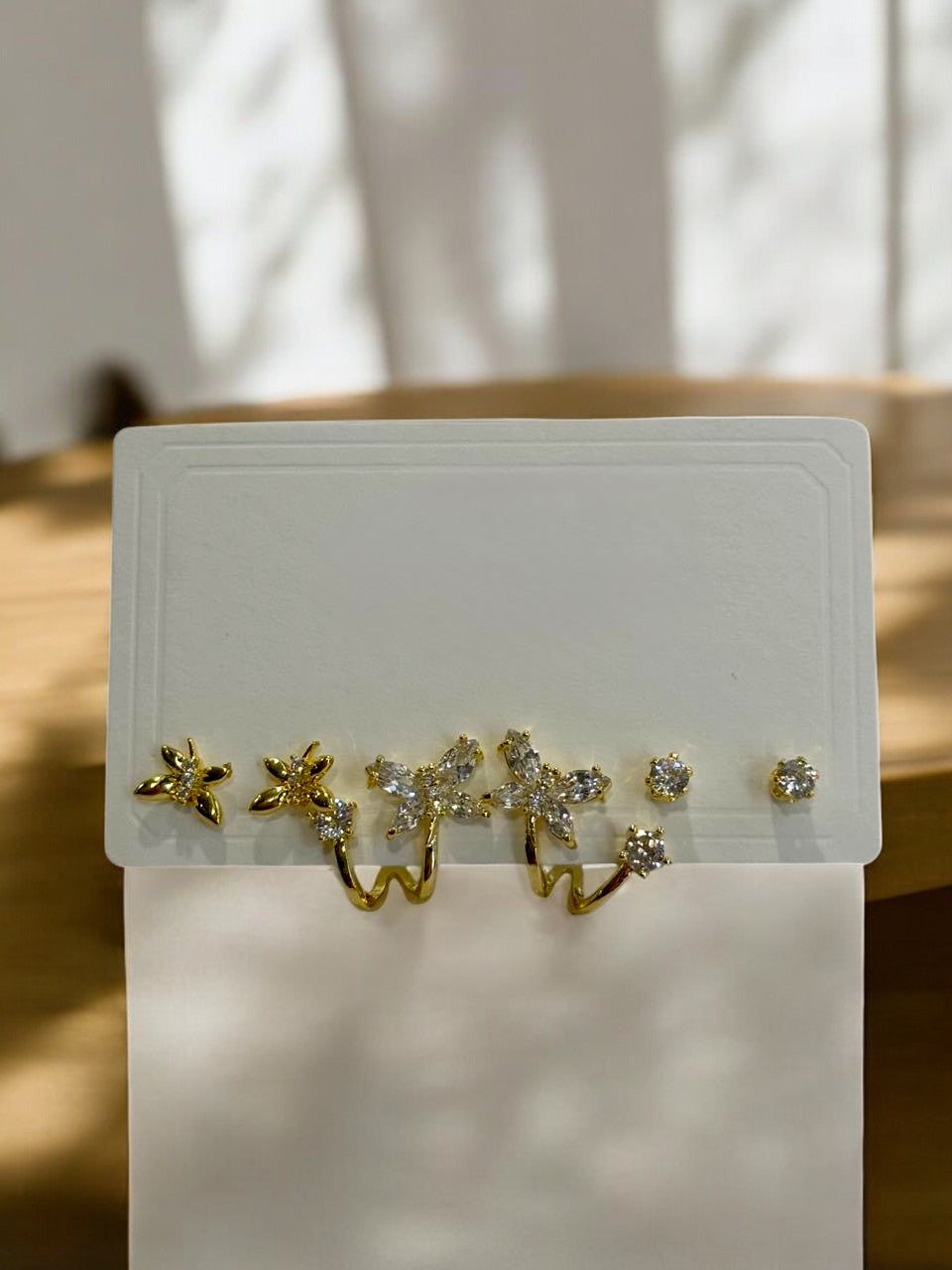 THREE PAIR OF EARRINGS
