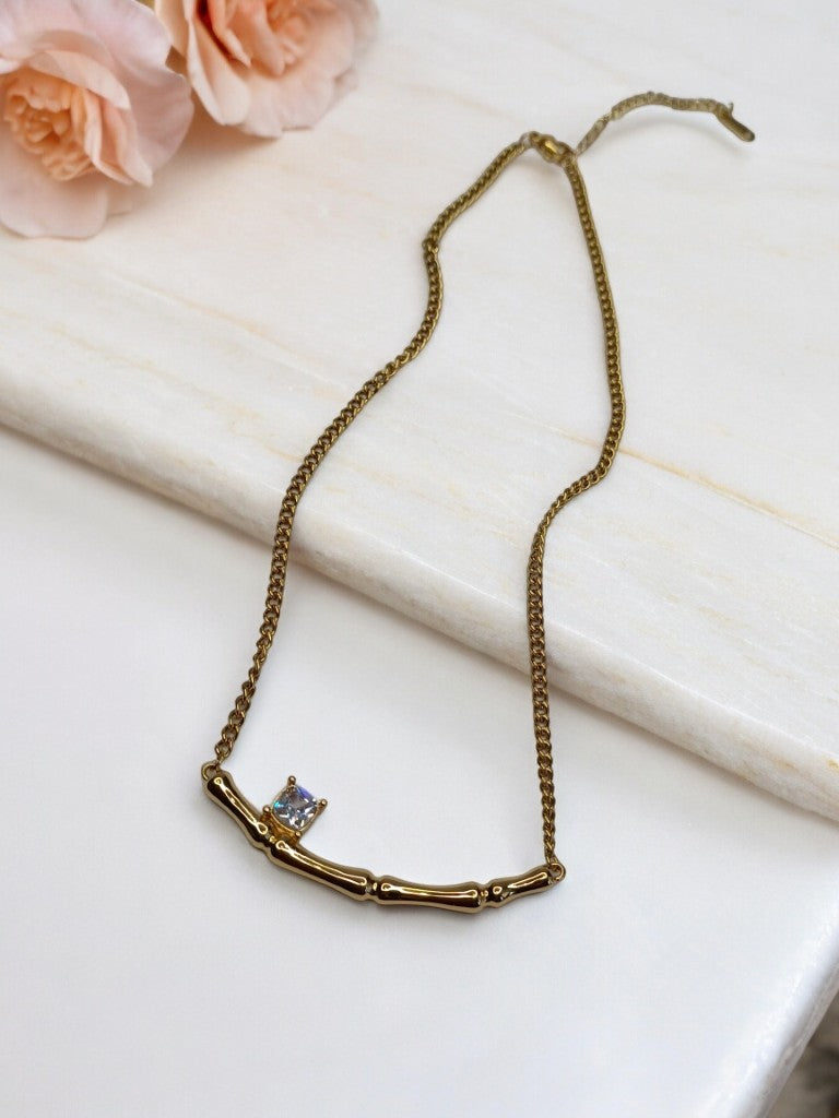 GOLDEN CHAIN WITH SIMPLE DESIGN AND ONE DIAMOND