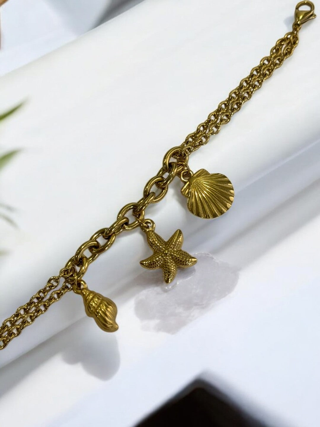 GOLDEN CHAIN BRACELET WITH CONCH, STARFISH, SEA SHELL
