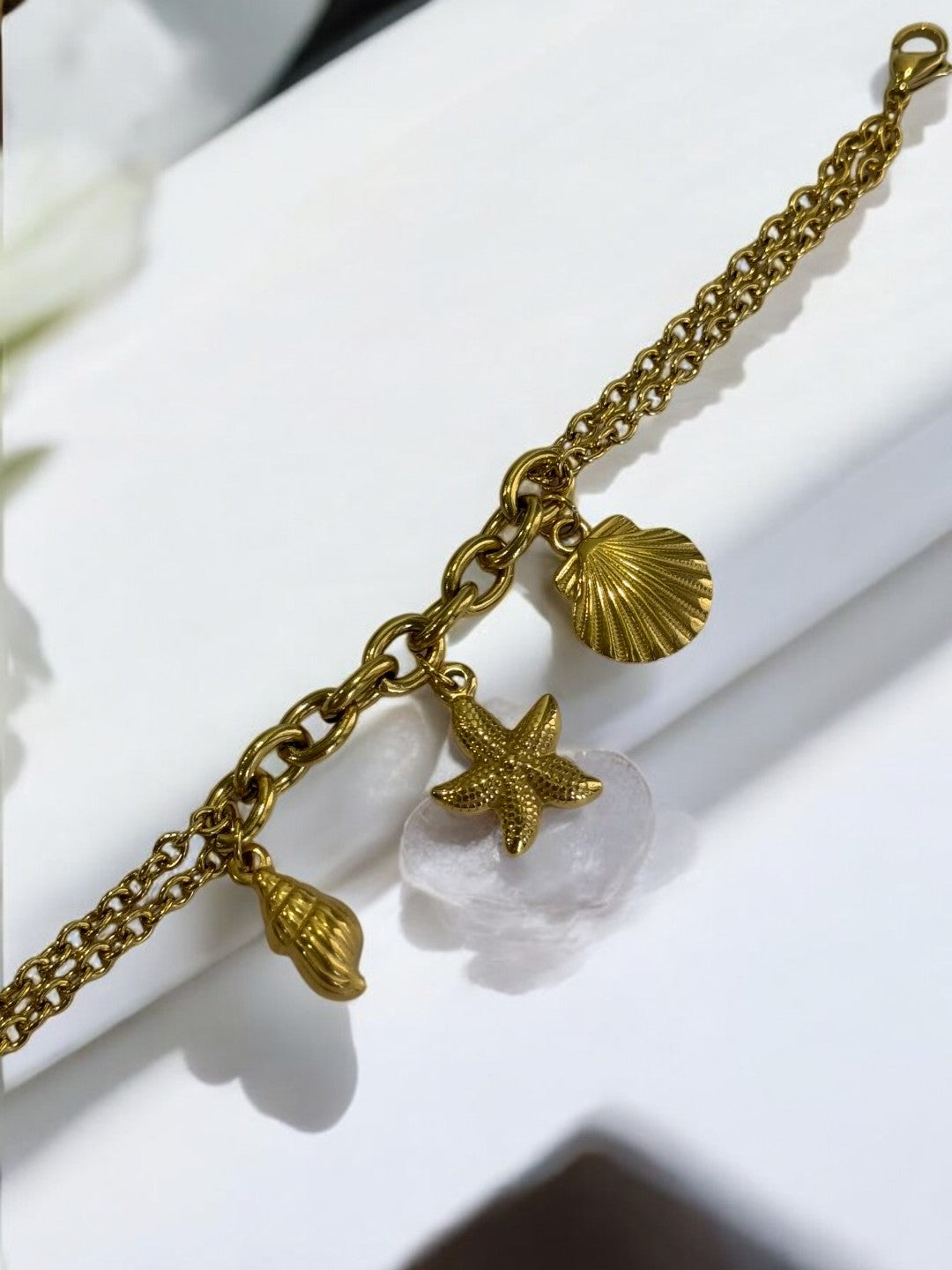 GOLDEN CHAIN BRACELET WITH CONCH, STARFISH, SEA SHELL