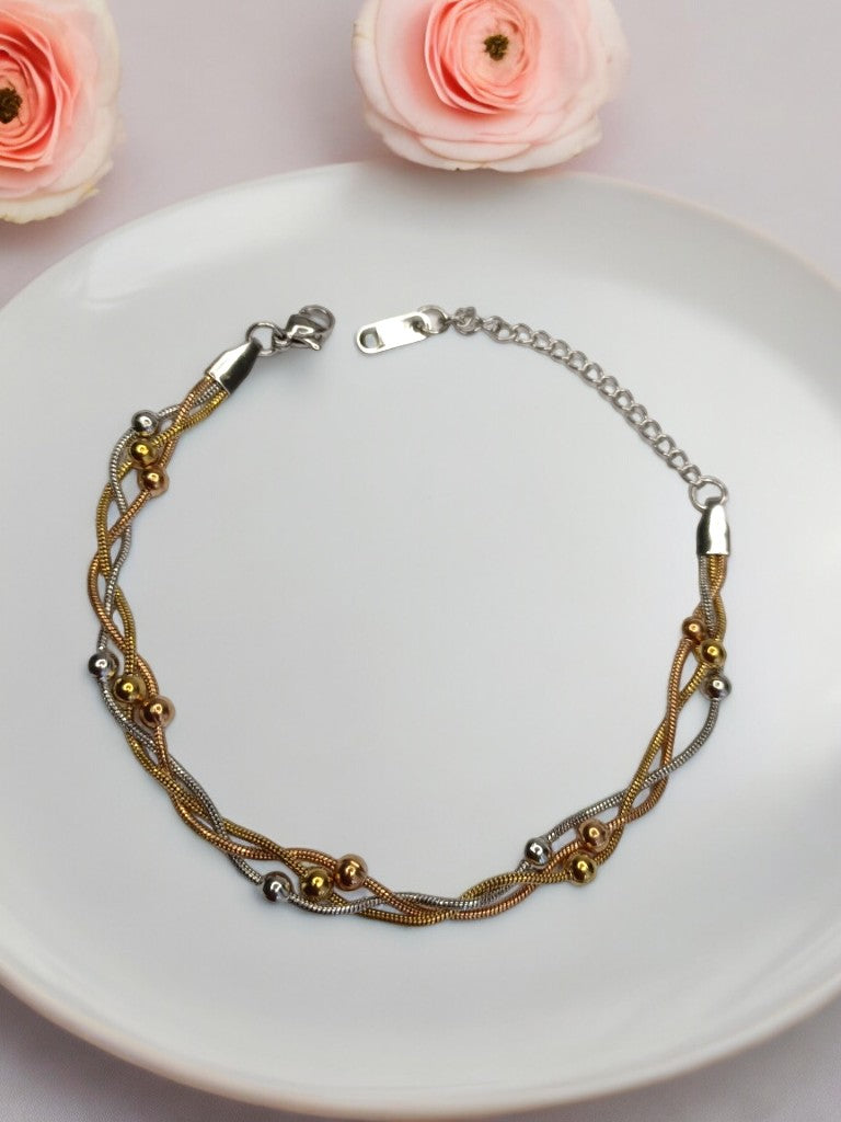 GOLD AND SILVER LAYERED WITH TINY BALLS