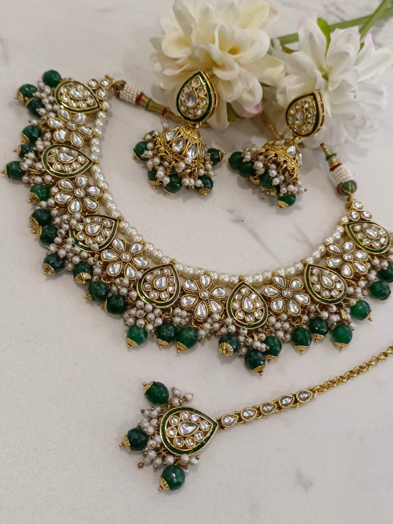 WHITE KUNDAN, WHITE PEARLS, HANGING GREEN PEARLS NECKLACE WITH DANGLING EARRING AND MANG TIKA