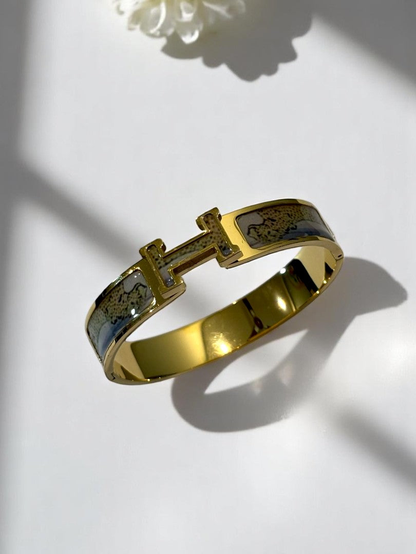GOLDEN LEOPARD HERMES PAUL BRACELET