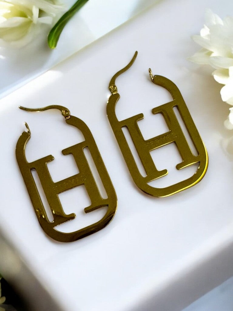 GOLDEN HERMES SLOANE EARRINGS