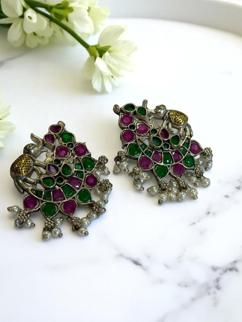 GREEN PINK STONE MRIDULA GERMAN SILVER EARRINGS
