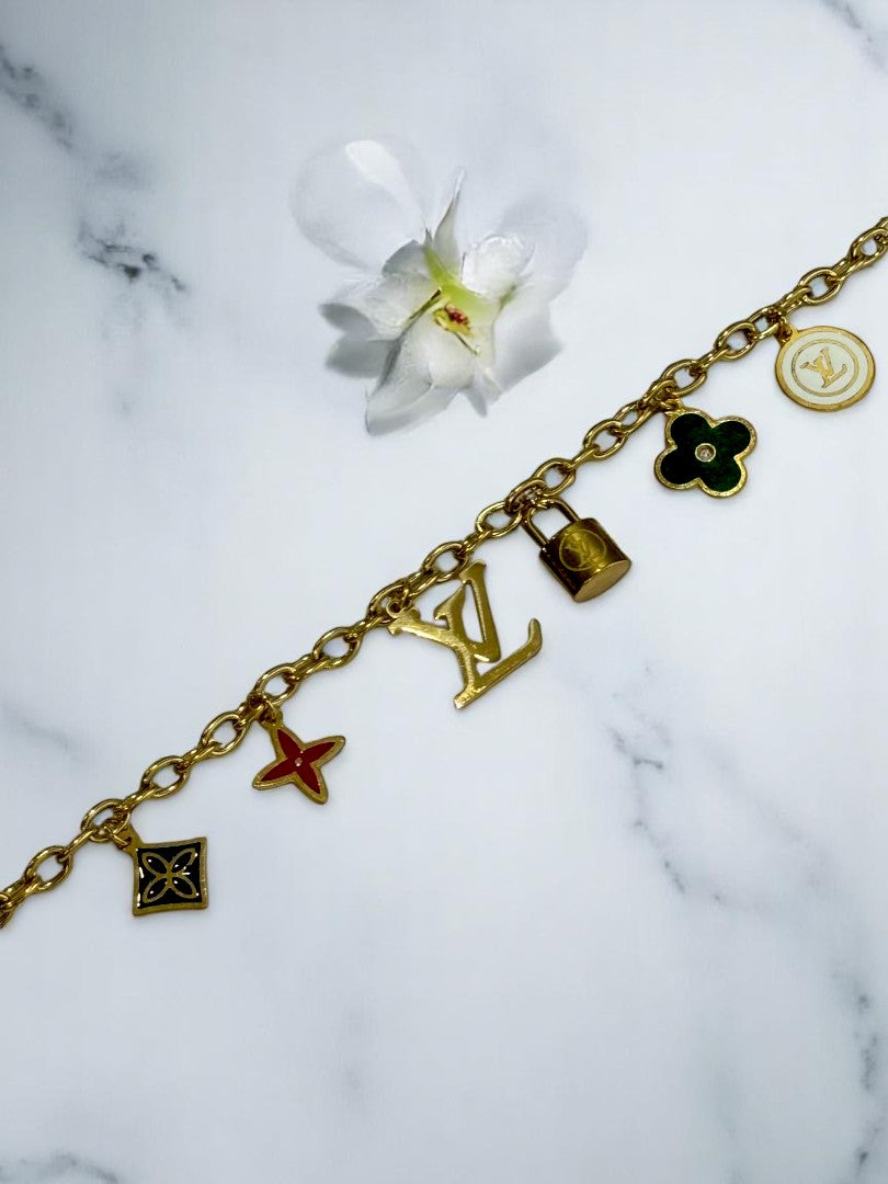 GOLDEN CHAIN WITH BRANDED MULTI CHARM BRACELET