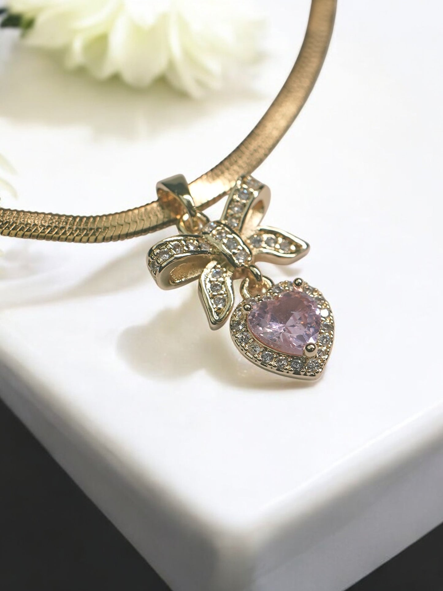 GOLDEN CHAIN WITH PINK DIAMOND AND TINY DIAMOND BOW