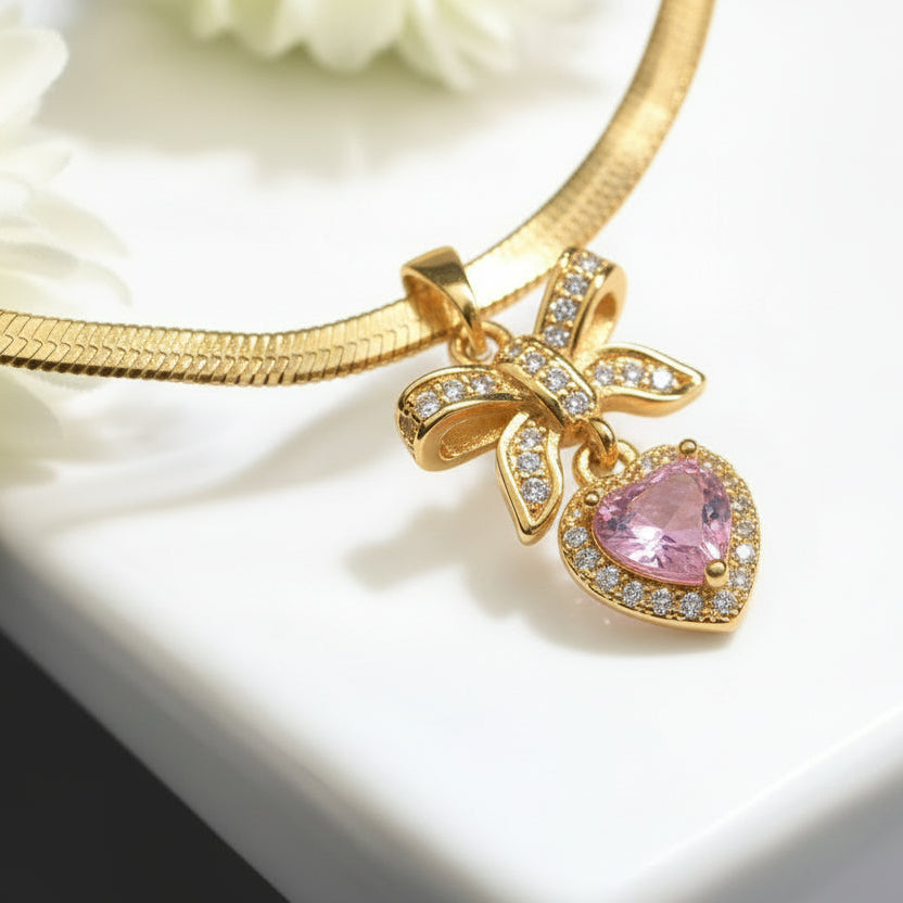 GOLDEN CHAIN WITH PINK DIAMOND AND TINY DIAMOND BOW