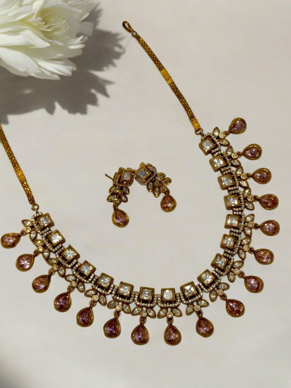 DIAMOND AND KUNDAN NECKLACE WITH PINK HANGING STONE AND EARRING