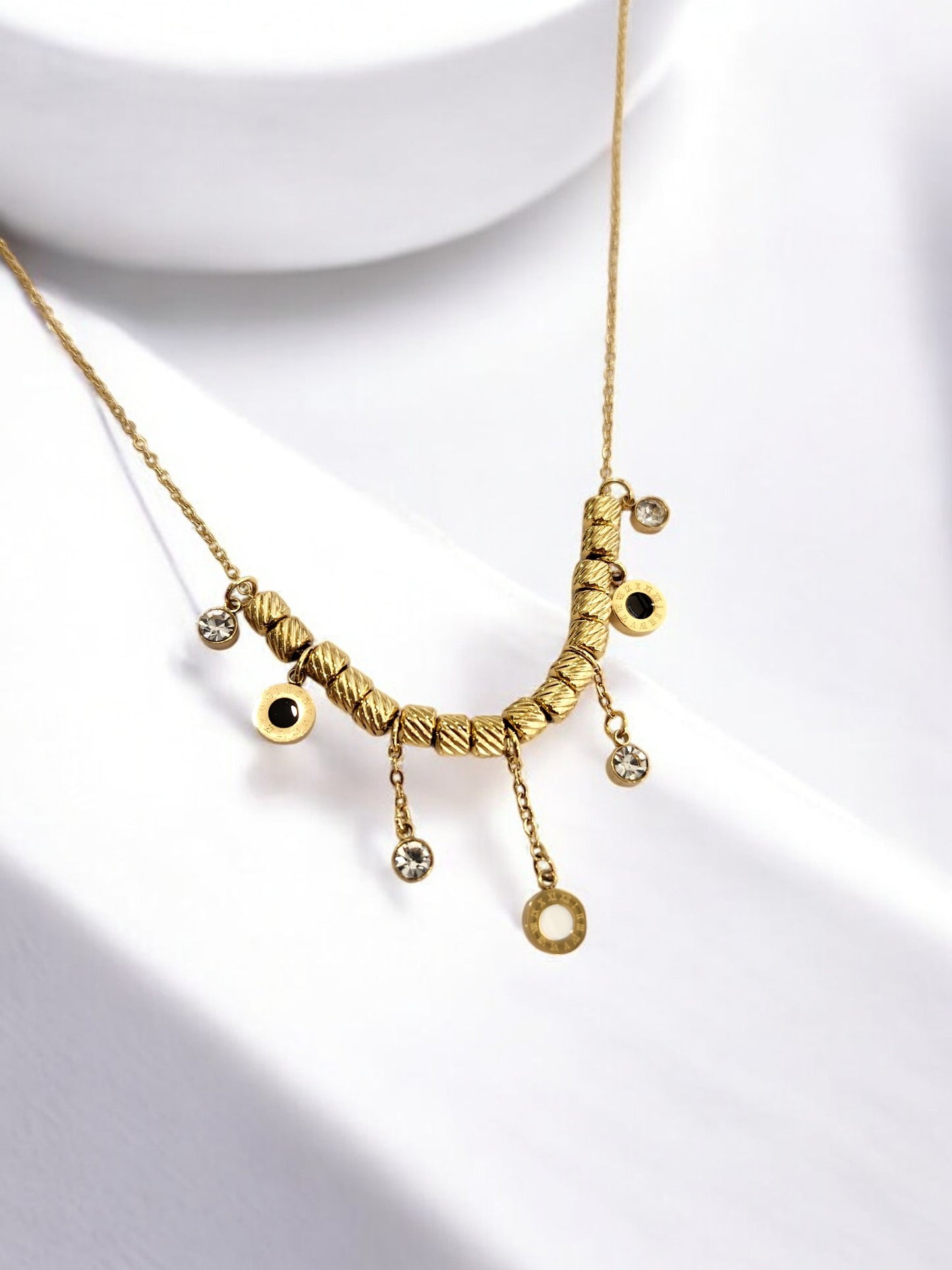 GOLDEN CHAIN WITH HANGINIG DIAMOND AND ROMAN NUMERAL CHARM