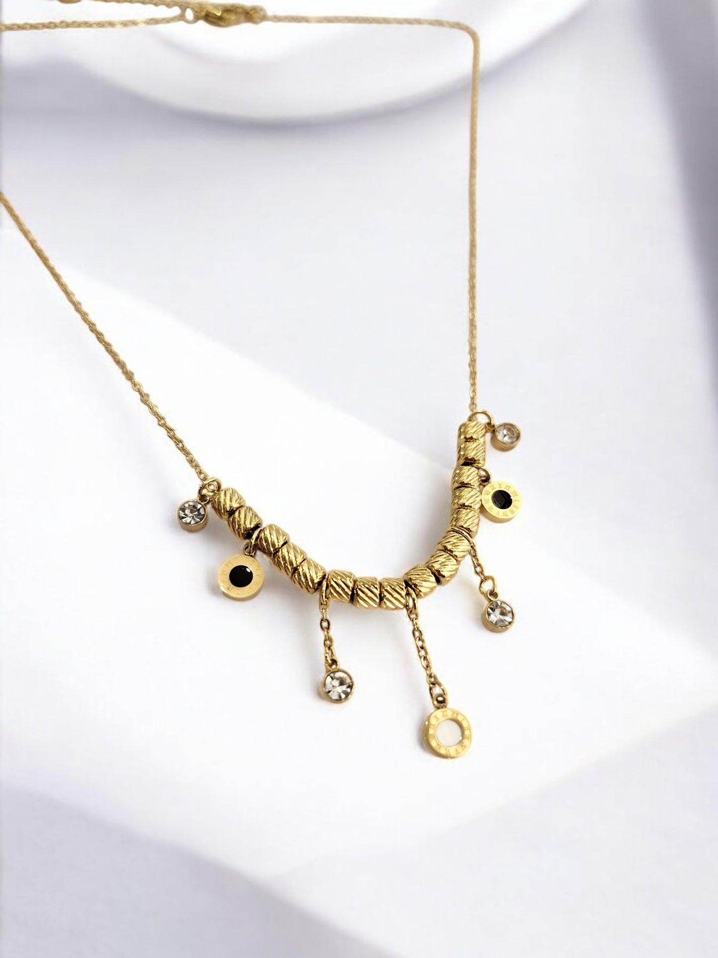 GOLDEN CHAIN WITH HANGINIG DIAMOND AND ROMAN NUMERAL CHARM