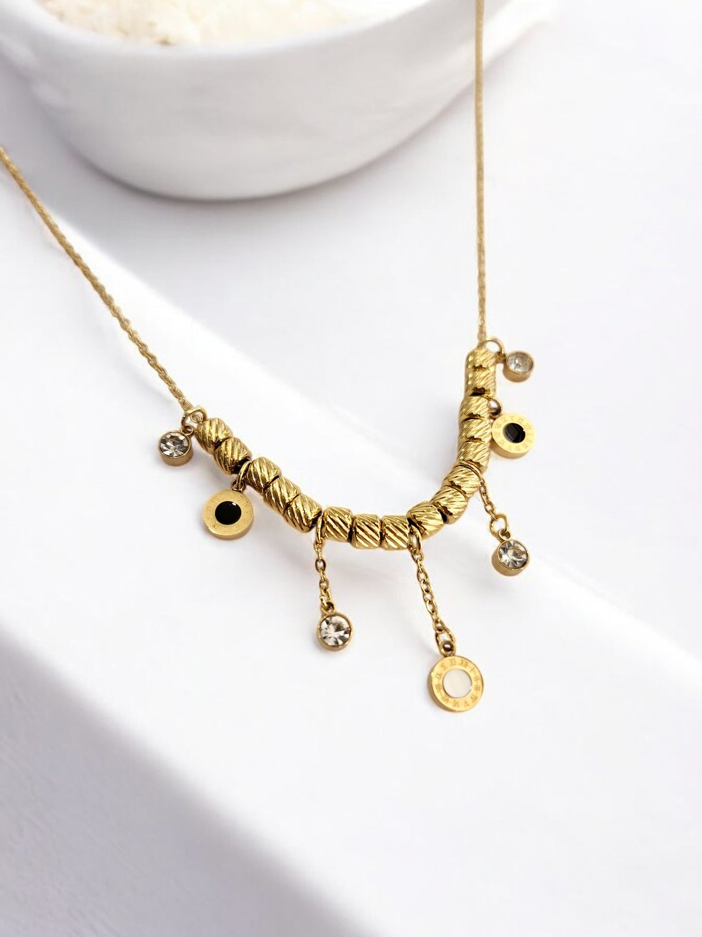 GOLDEN CHAIN WITH HANGINIG DIAMOND AND ROMAN NUMERAL CHARM