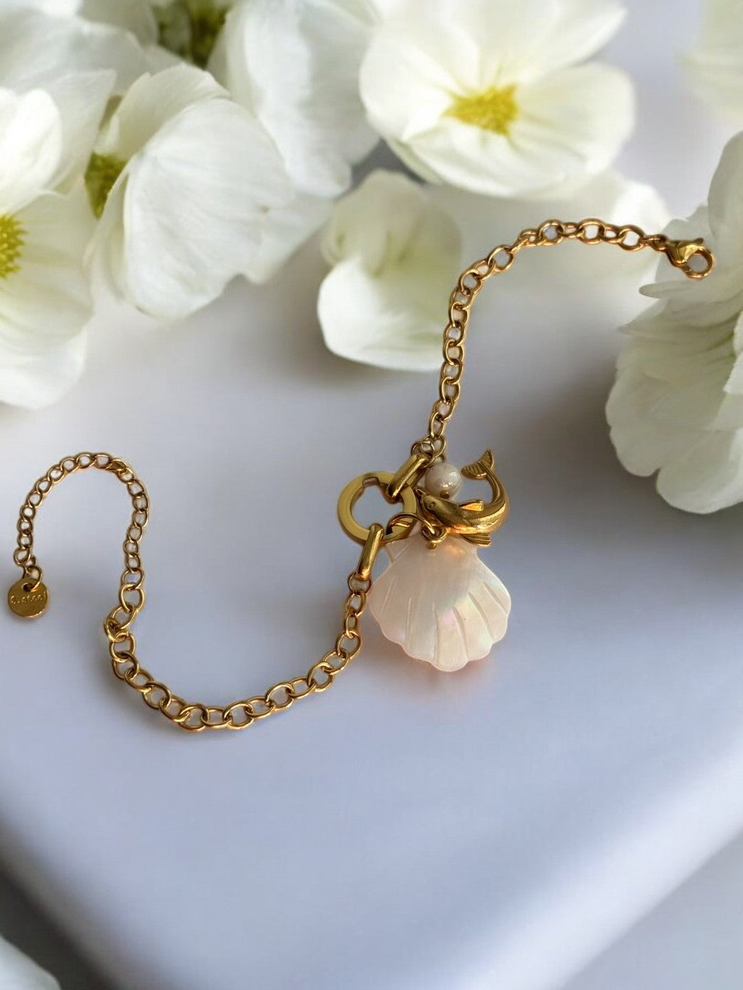 GOLDEN CHAIN WITH OCEAN CHARMS LIKE DOLPHIN, WHITE SEA SHELL AND PEARL