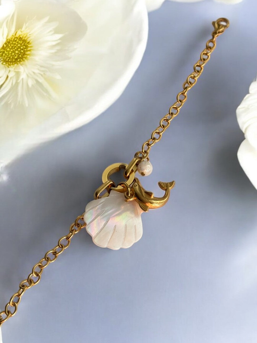 GOLDEN CHAIN WITH OCEAN CHARMS LIKE DOLPHIN, WHITE SEA SHELL AND PEARL