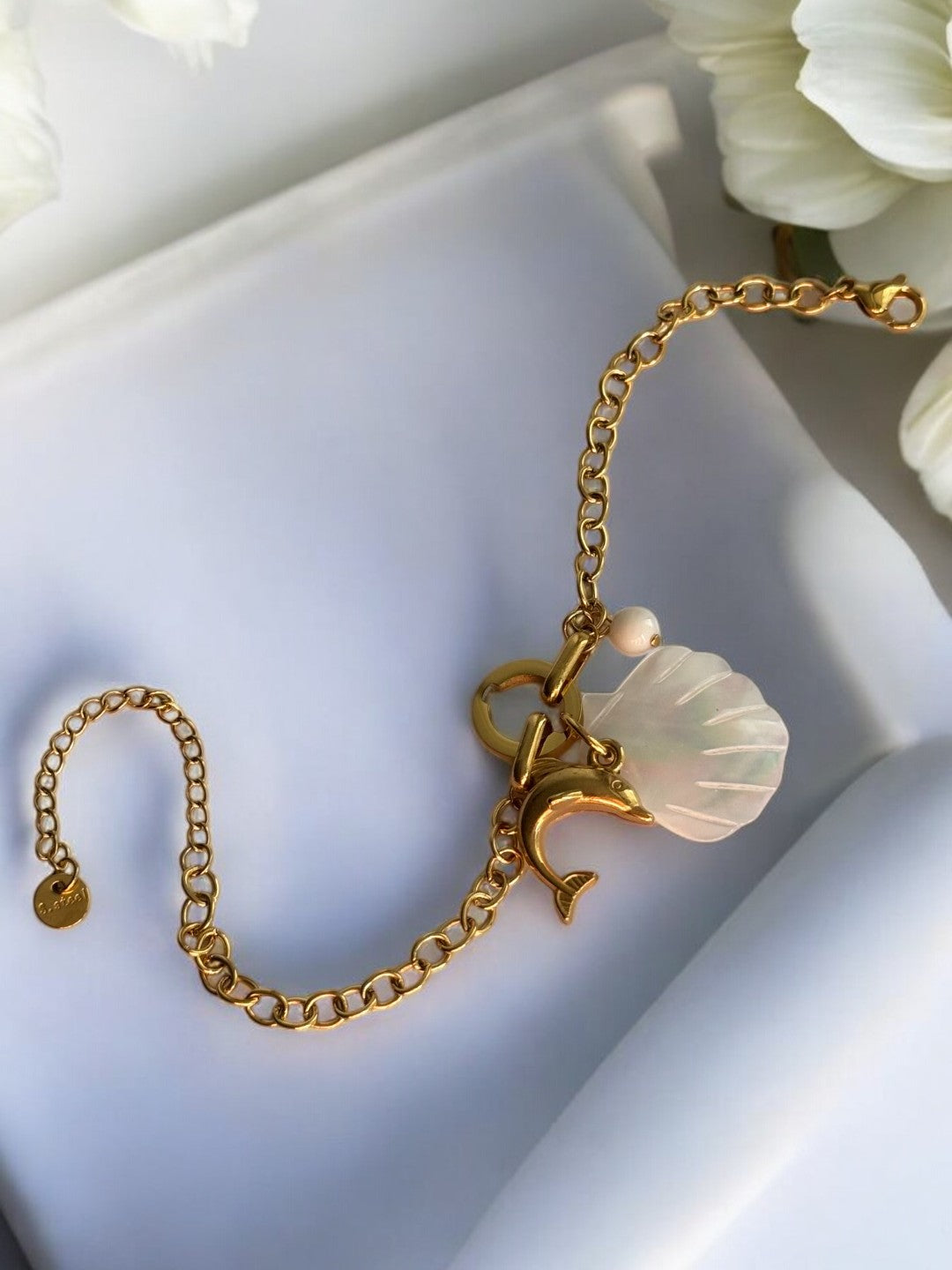 GOLDEN CHAIN WITH OCEAN CHARMS LIKE DOLPHIN, WHITE SEA SHELL AND PEARL
