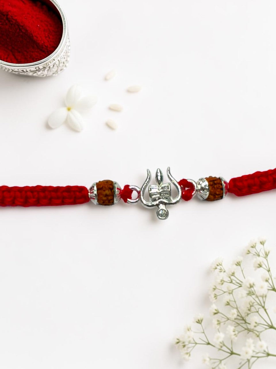 DAMRU TRISHUL DHRUVI SILVER RAKHI