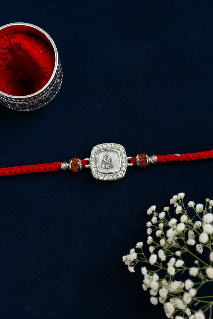 WHITE GANESH BHANUPRIYA SILVER RAKHI