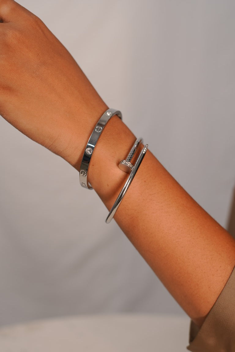 SILVER DIAMOND NAIL AND CARTIER LUXURY BRAND