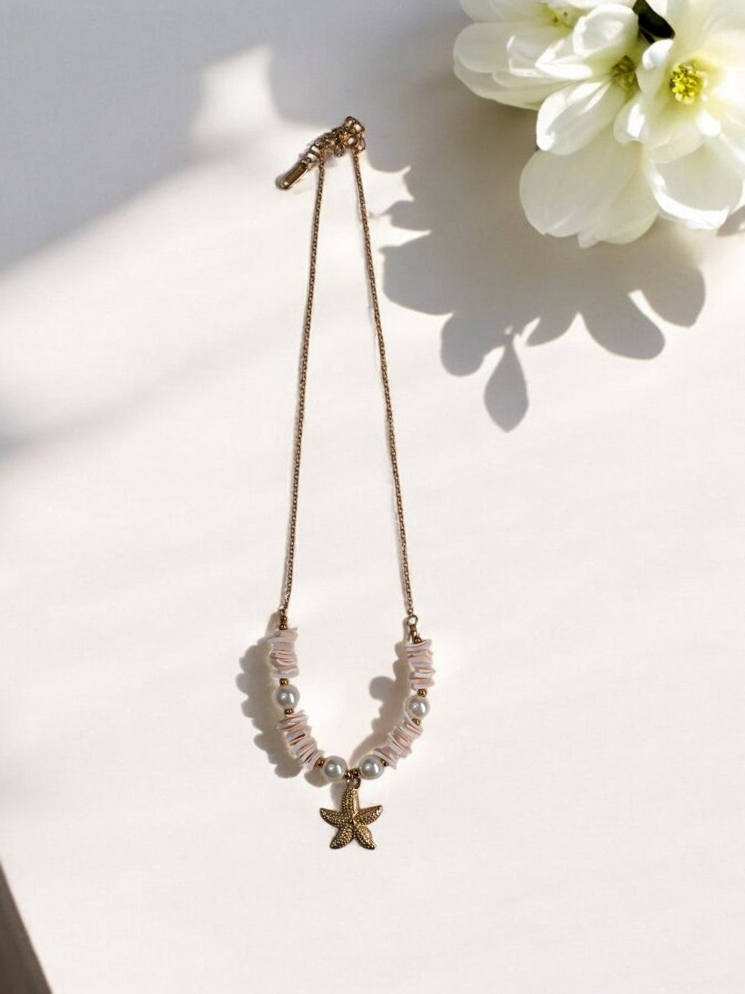 GOLDEN CHAIN WITH STAR FISH AND PEARLS