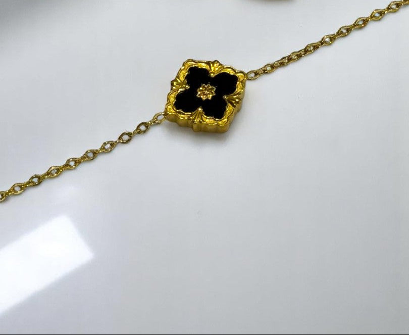 GOLDEN CHAIN WITH BLACK AND WHITE REVERSABLE BRACELET AND STUD EARRINGS