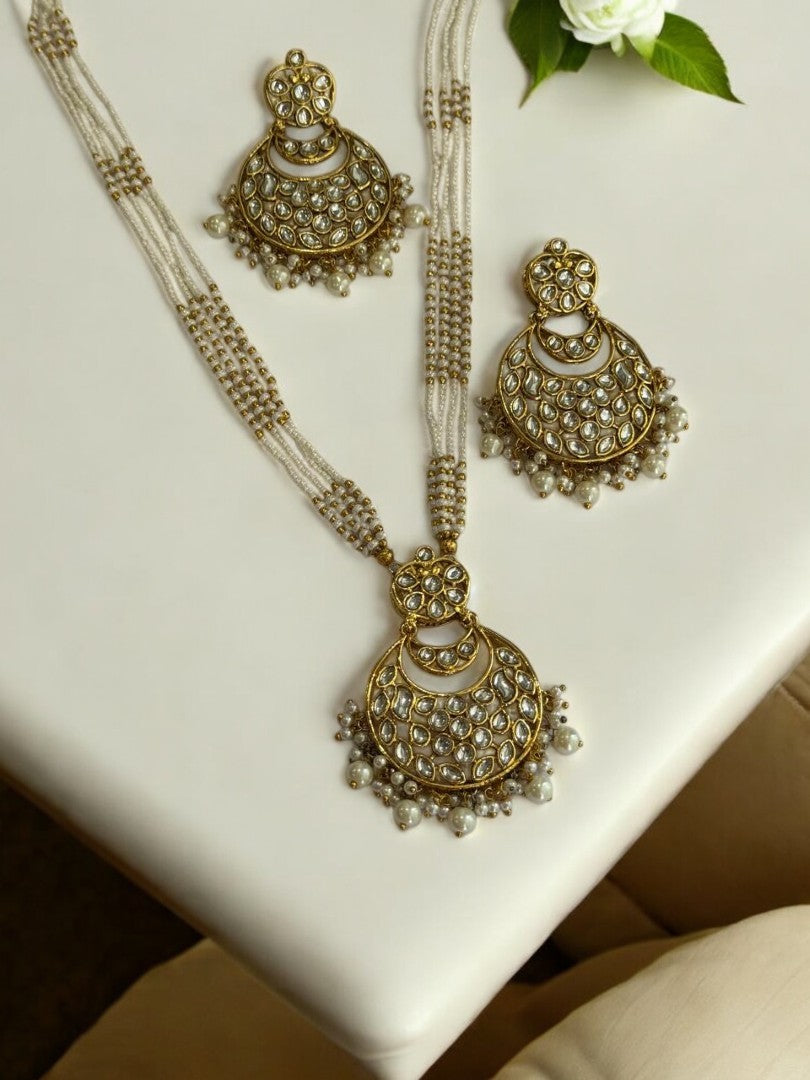WHITE AND GOLDEN MALA WITH KUNDAN PENDENT WITH HANGING WHITE PEARL AND MATCHING EARRINGS