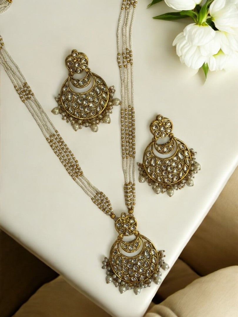 WHITE AND GOLDEN MALA WITH KUNDAN PENDENT WITH HANGING WHITE PEARL AND MATCHING EARRINGS