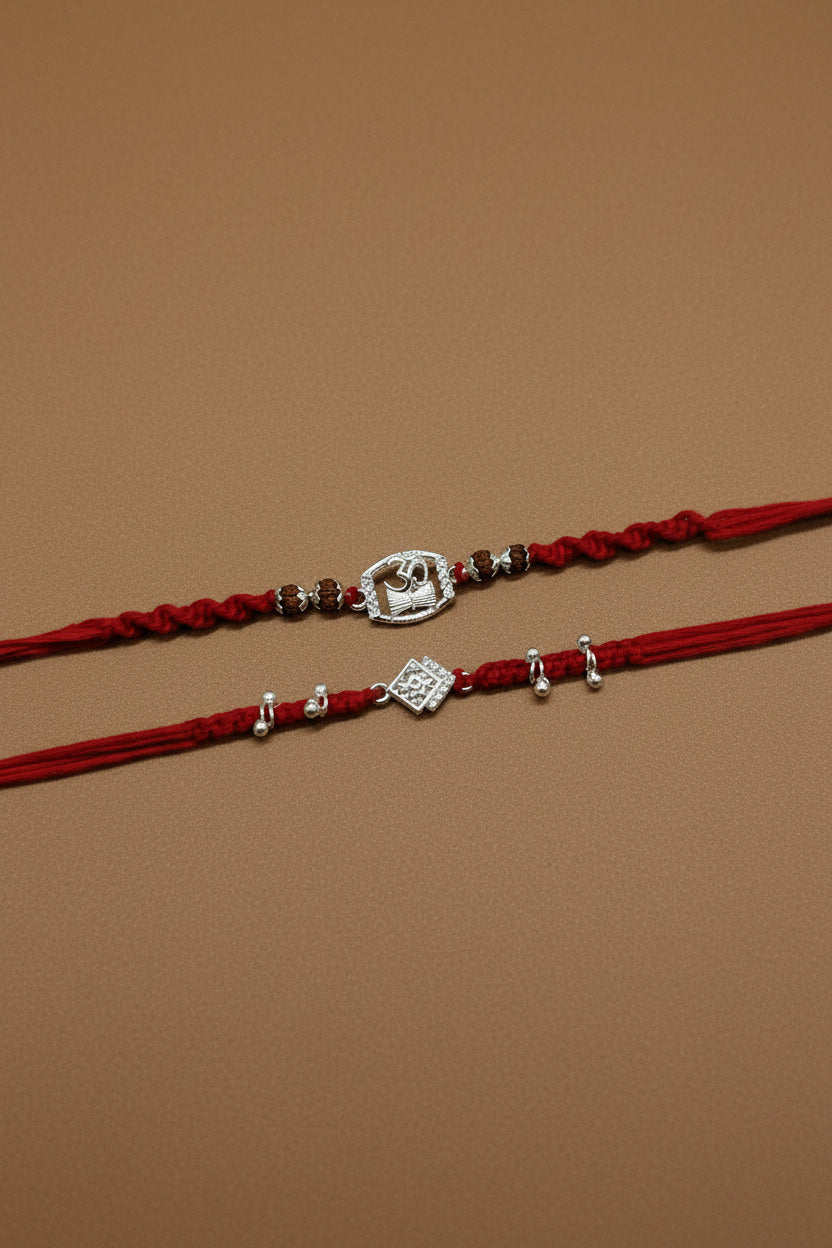 OM DAMRU DIAMOND AMORA COUPLE SILVER RAKHI