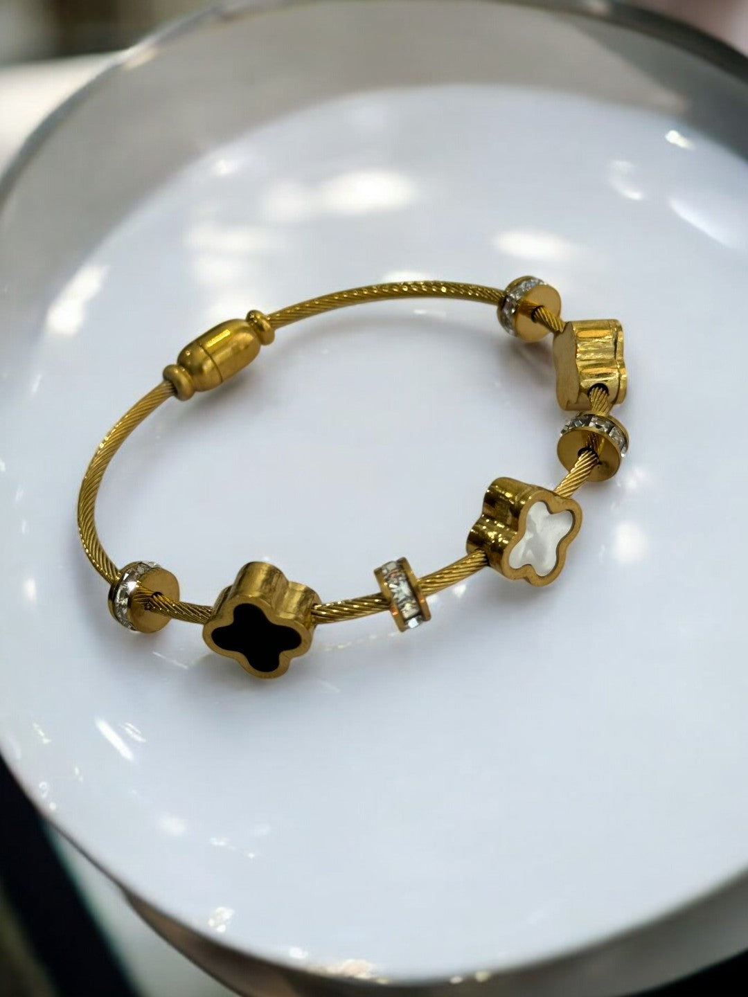 BLACK AND WHITE CLOVER TATVIKA BRANDED BRACELET
