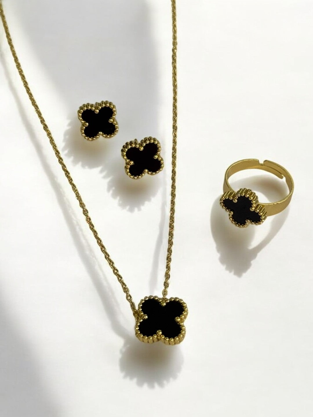 GOLDEN CHAIN WITH BLACK CLOVER PENDENT, EARRINGS, AND FINGER RING