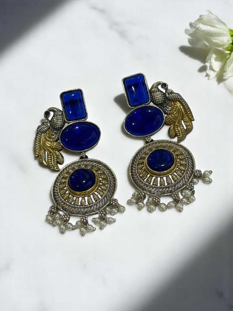 GERMAN SILVER DUAL TONE BLUE STONE PEACOCK DANGLE EARRINGS