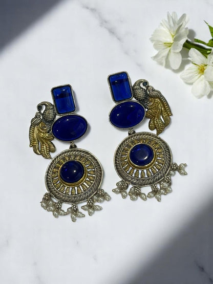 GERMAN SILVER DUAL TONE BLUE STONE PEACOCK DANGLE EARRINGS