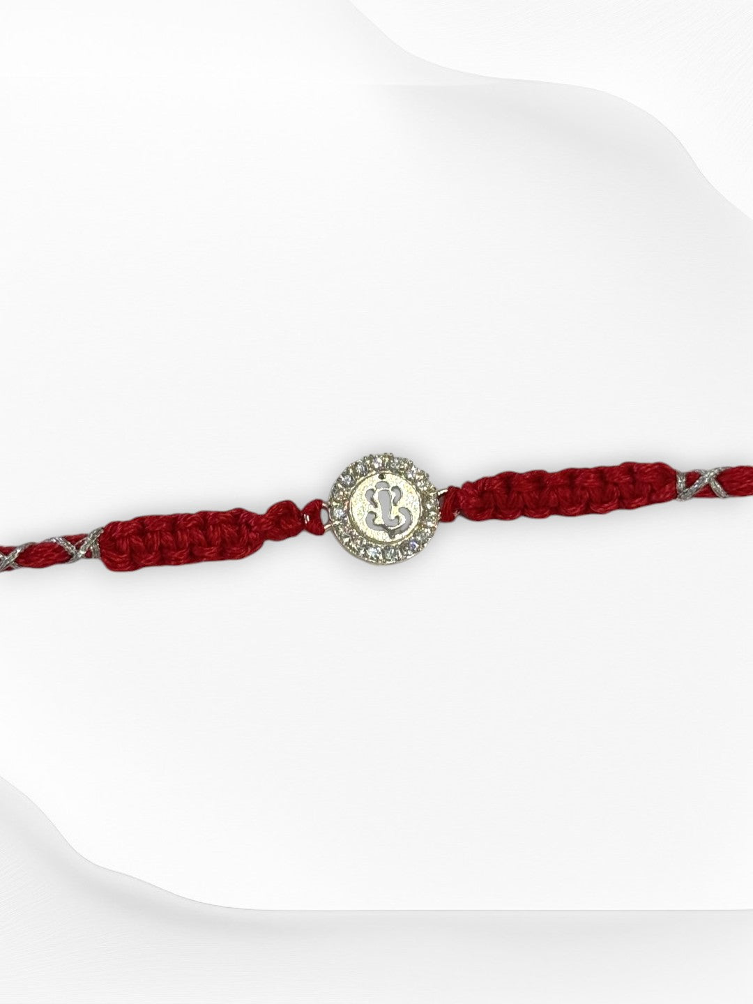 DIAMOND GANESHA TARINI PURE SILVER RAKHI