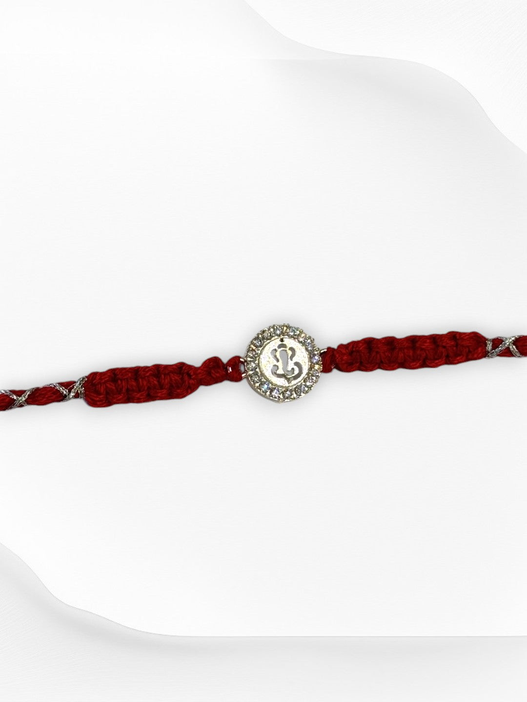 DIAMOND GANESHA TARINI PURE SILVER RAKHI